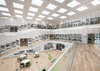 Stairs spiral around interior of Adept's Dalarna Media Library.jpg