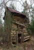 old falling down log cabin in the woods ___ I saw one very ___.jpg