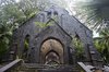 Ruin-of-abandoned-church-covered-with-roots-on-Ross-Island.jpg